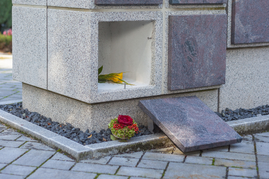 Upright cremation plot, with memorial tablet face ready for inscription by monumental stonemason