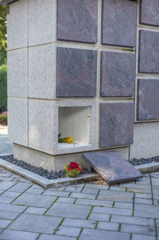 Upright cremation plot, with memorial tablet face ready for inscription by monumental stonemason